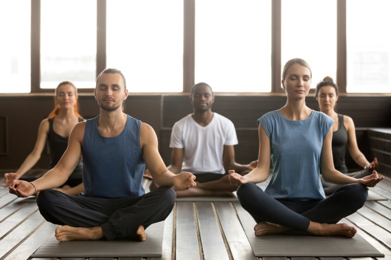 Group of people Doing Yoga